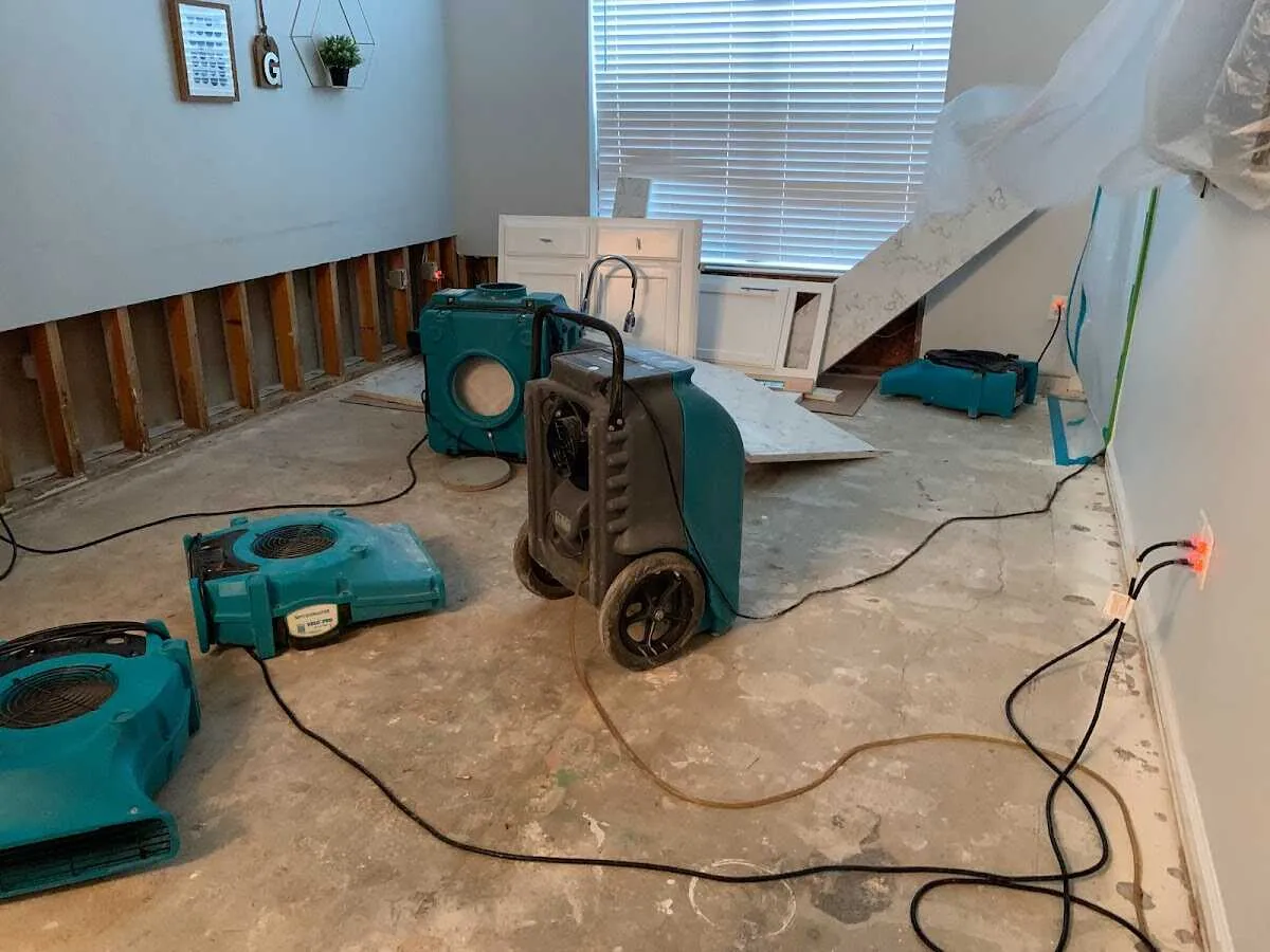 Dehumidifier in flood-cut room for Water Damage Restoration in Edgewater